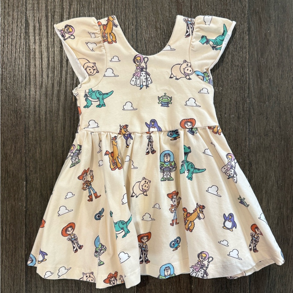 Monica & Andy Disney Cream Toy Story Dress Size 12-18 Months